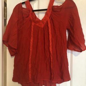 Coral/orange-red cold shoulder top